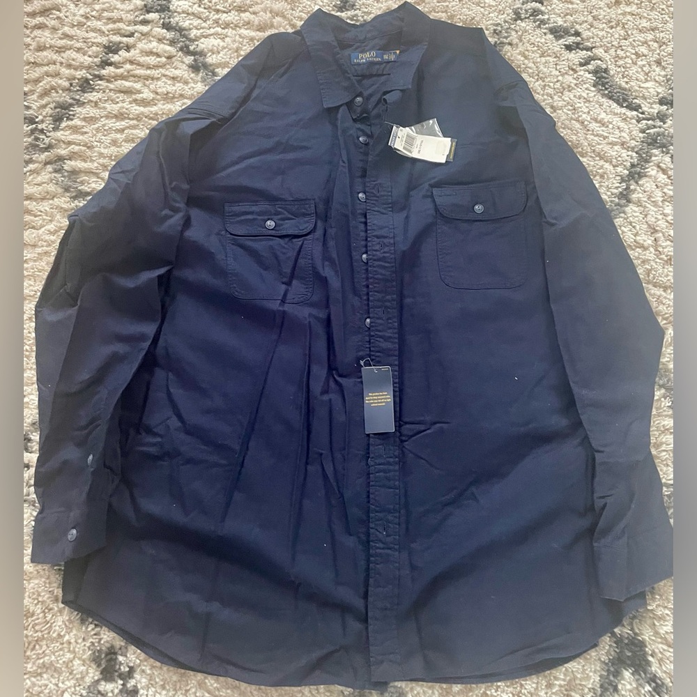 Brand new. Solid, Navy Blue, button up Polo shirt. Size 3x.